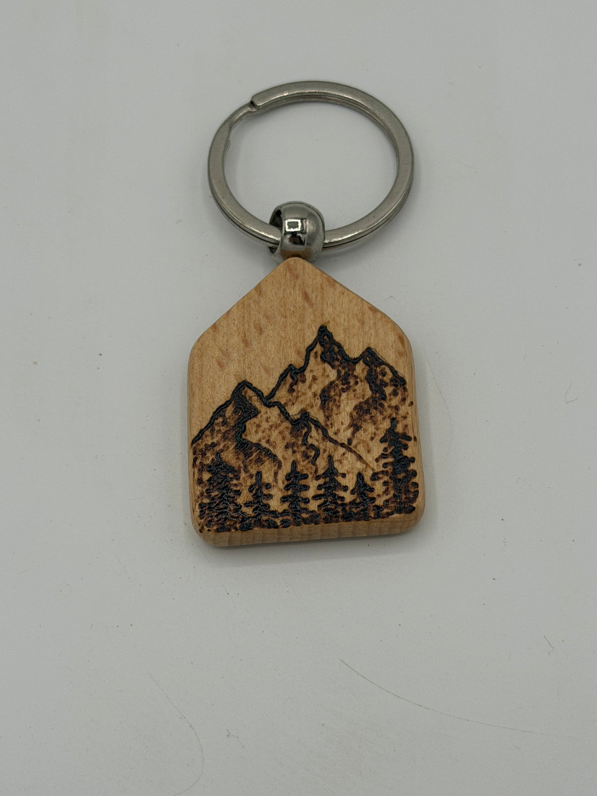 Black and brown Wooden Hive Studio Key chain