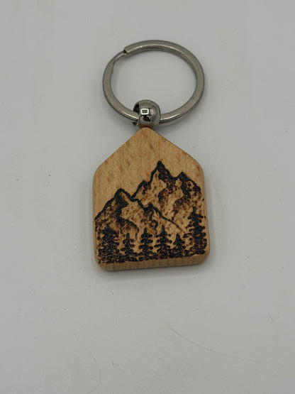 Black and brown Wooden Hive Studio Key chain