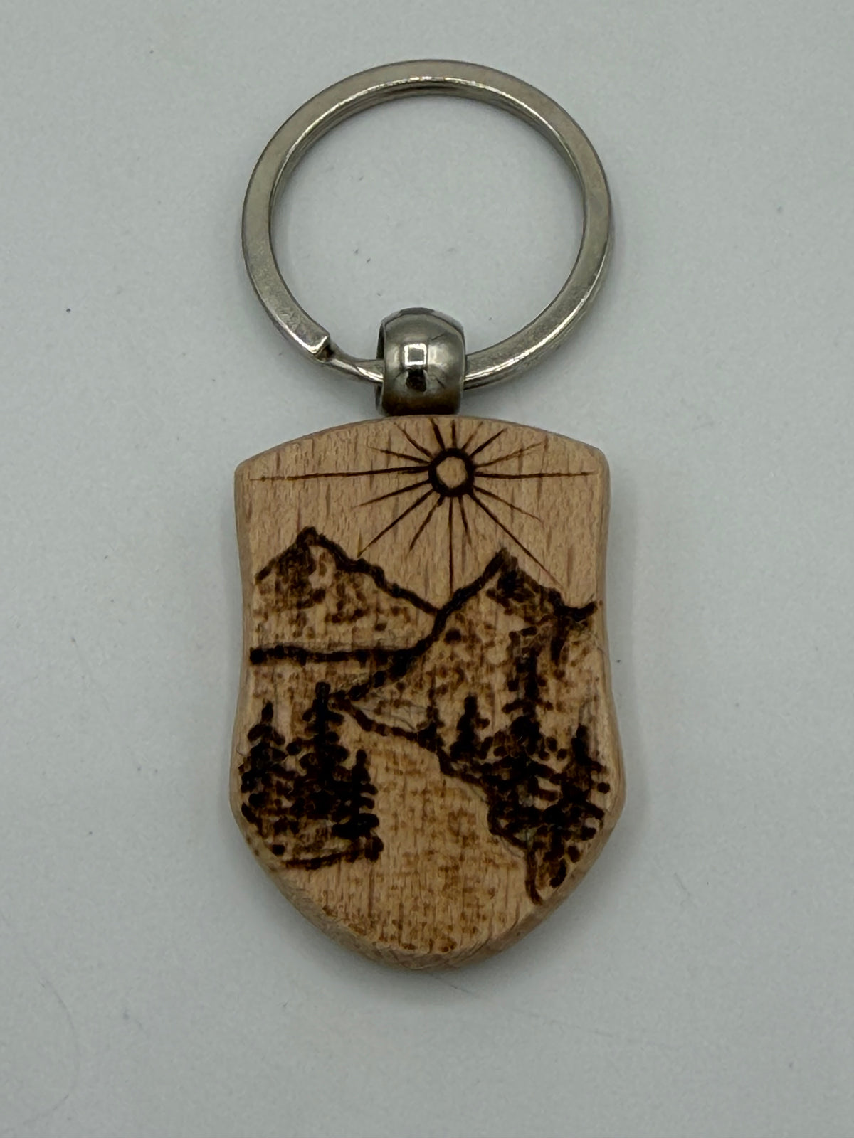 Brown and black Wooden Hive Studio Key chain